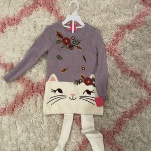 Never worn Isaac Mizrahi dress with tights. Tag still on!